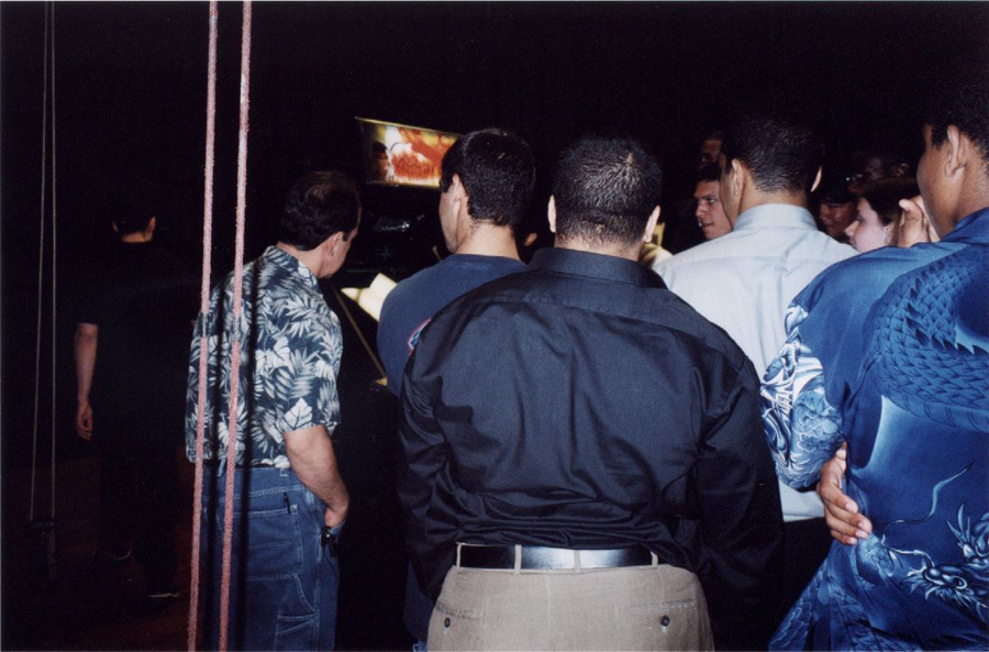 The kRiSiS Arcade being played by the crowd