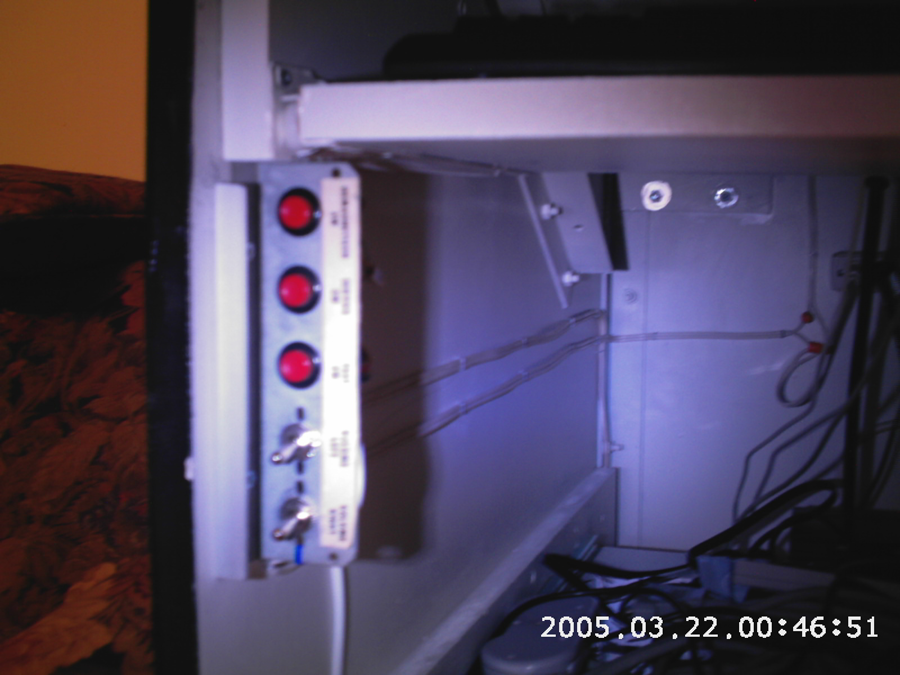 Power switches for the computer, lighting, and ventilation.
